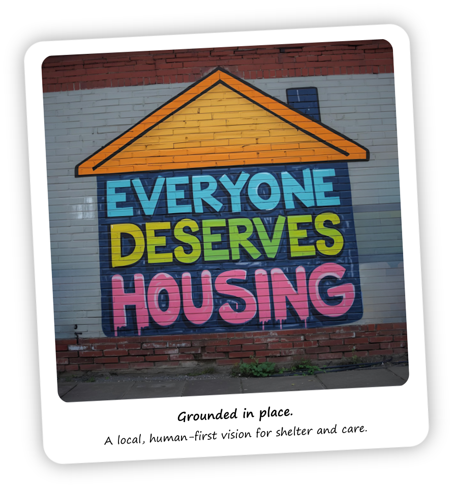 Mural that reads Everyone Deserves Housing.